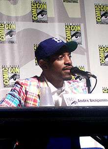 A man speaks to a microphone at the San Diego Comic Con.