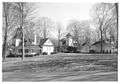 alt=Houses and outbuildings