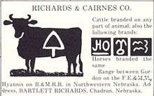 Silhouette of cow with brand marked on it: triangle pointing upward with rounded sides and a vertical projection from lower edge, like a spade