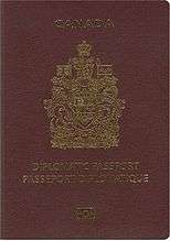 Cover of Canadian Diplomatic e-Passport. Cover is maroon colour with a gold-coloured crest. Text reads "CANADA" and "DIPLOMATIC PASSPORT" and "PASSEPORT DIPLOMATIQUE"
