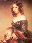 portrait, against blank pale background, of woman in late twenties, dark hair in ringlets, in dark silk dress with pelisse, holding a rose, three-quarters turned to viewer