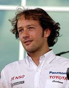Man in his early thirties looking to the right of the camera.