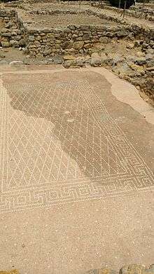 A mosaic in the Neapolis. "Ηδύκοιτος", "the pleasure of lying down" can be seen at the top.