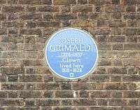 blue plaque commemorating Grimaldi