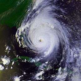 A view of Hurricane Floyd from Space on September 14, 2009. The storm is mature and well-defined, with a pronounced eye feature. Floyd is located over the Bahamas, and to the north and east of Cuba and Florida, respectively.