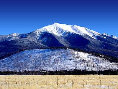 A color image of a snow-covered mountain