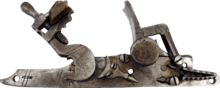 External view of a cocked snaphance lock
