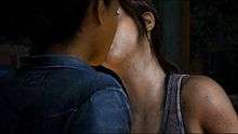 Riley is kissed by Ellie; both are young girls.
