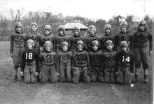 Group photograph of boys in football uniforms